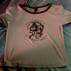 brand is dazy, size small, tan color with brown details